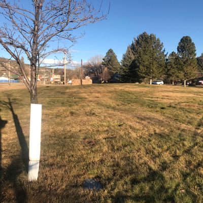 Second tee from small tree near victims memorial.