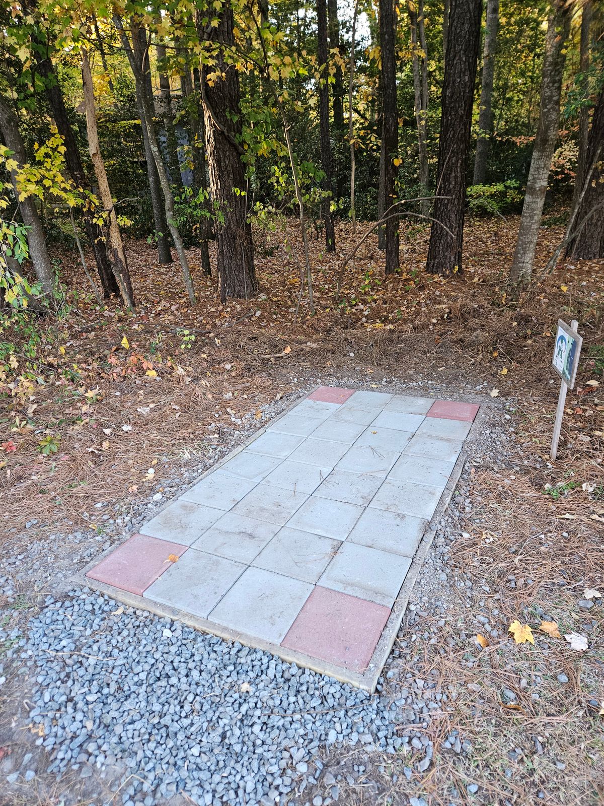 Hole 18 tee pad with your back to the basket