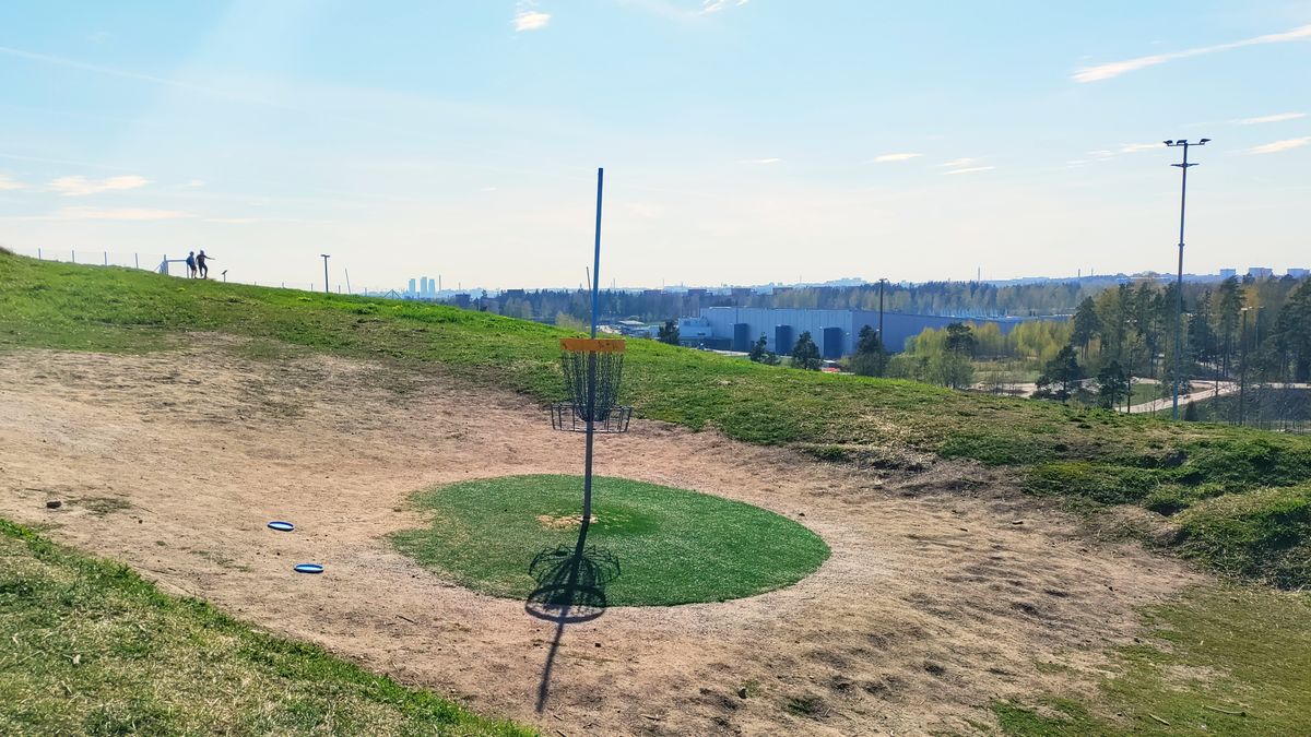 After climbing the steep uphill fairway of hole 9, you're greeted with this gorgeous view of the city of Helsinki.