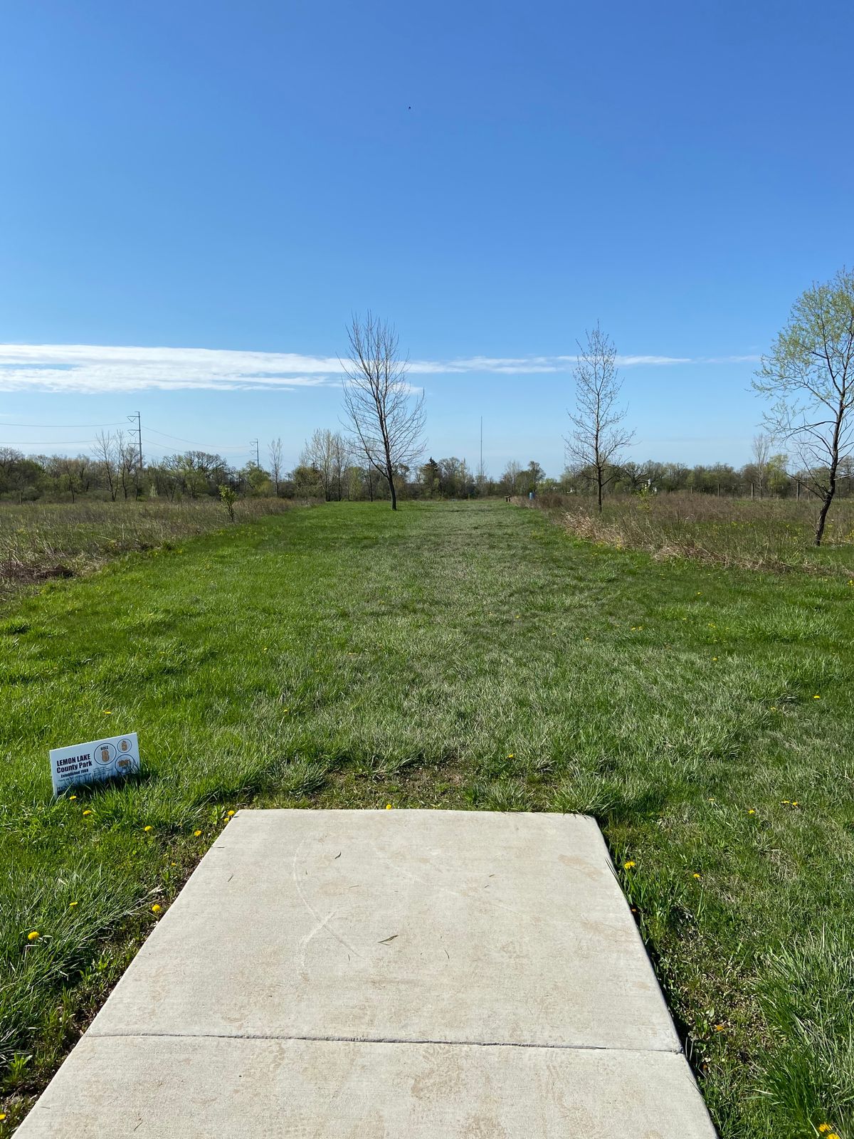 Tee of hole 8. Very long 1098 foot hole. Weeds are long in the summer. Hit the fairway.