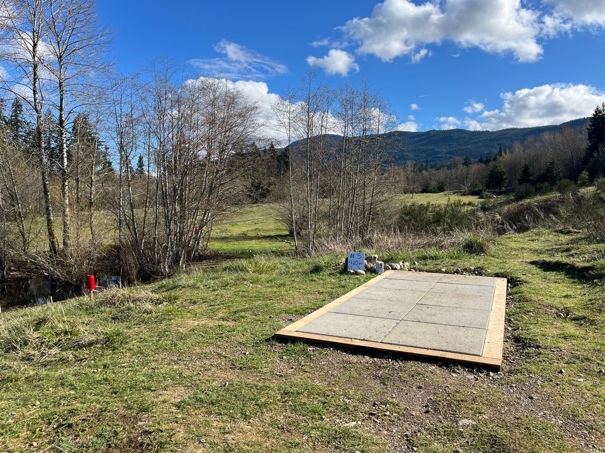 Hole #5 tee pad looking at Mount Benson.