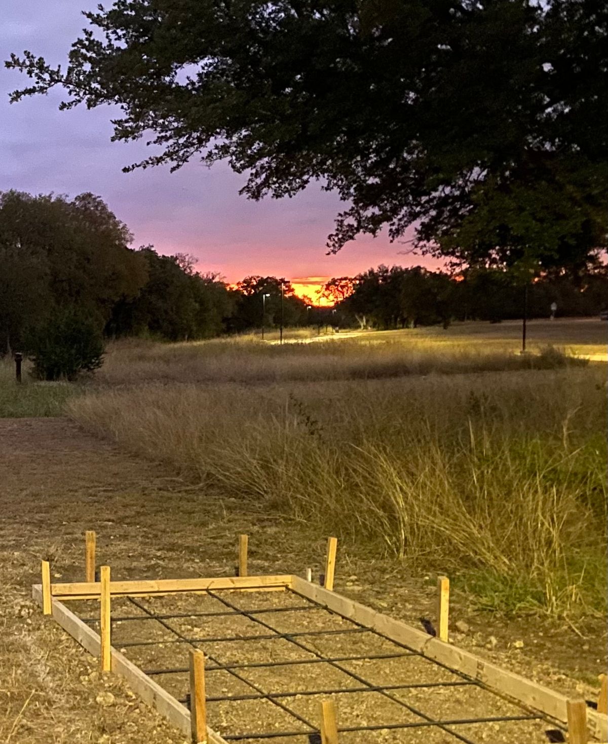 Sunset before the tee pad pour on hole 15.