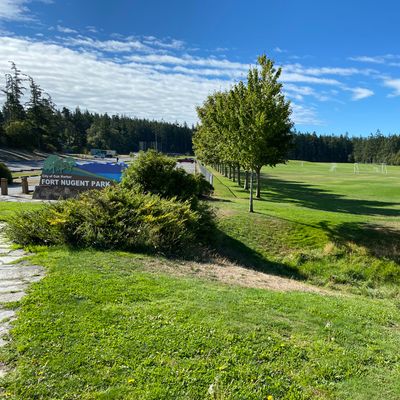 Hole 18 and park entrance sign.