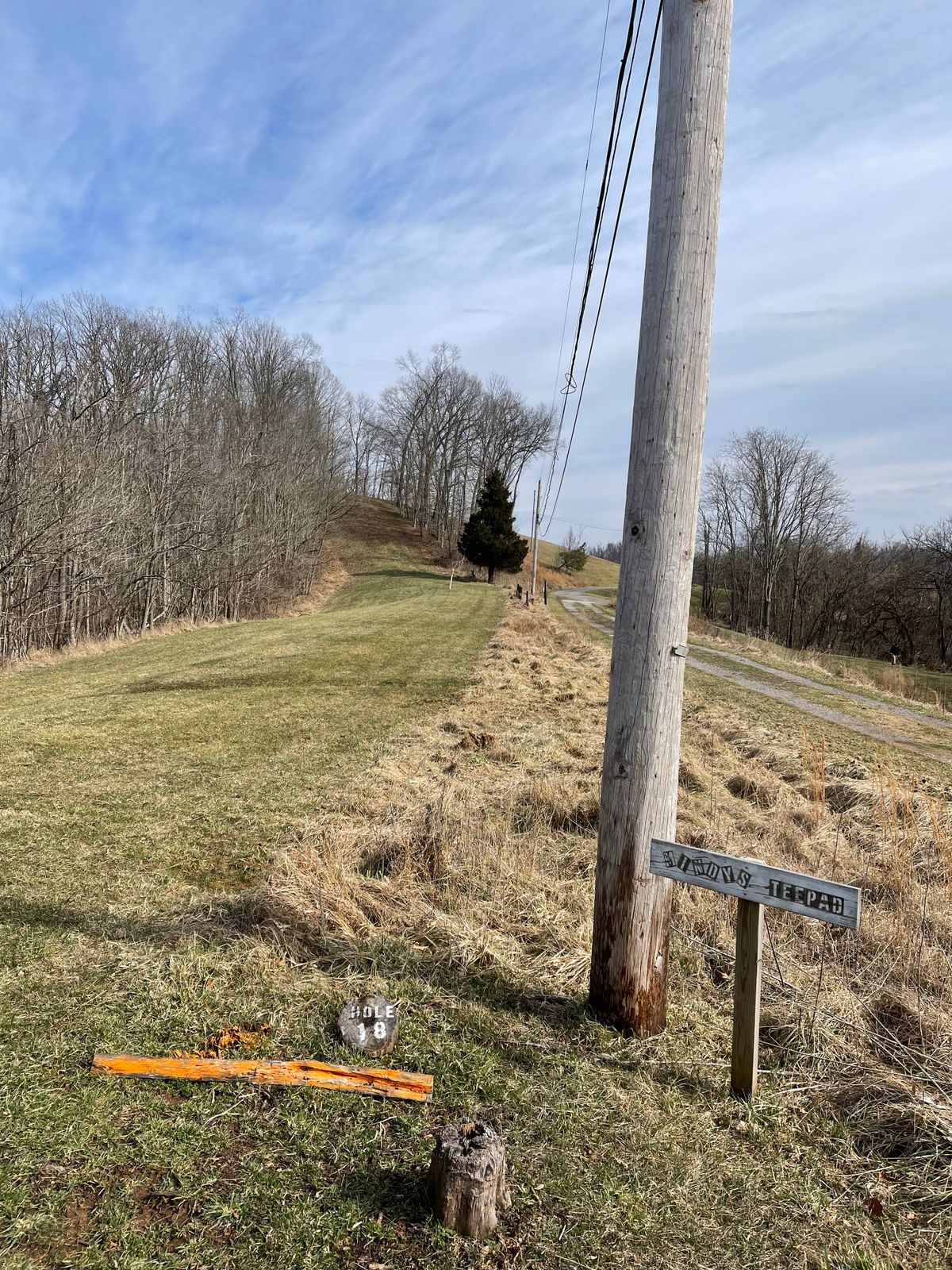 Hole 18 (Teebox, Mindys Tee, basket is at top of the hill following the fairway)