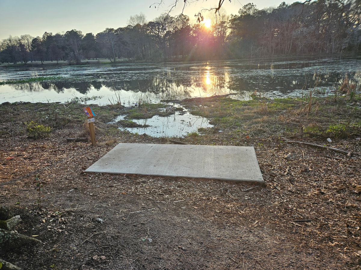 Tee pad 6, overlooking the water.