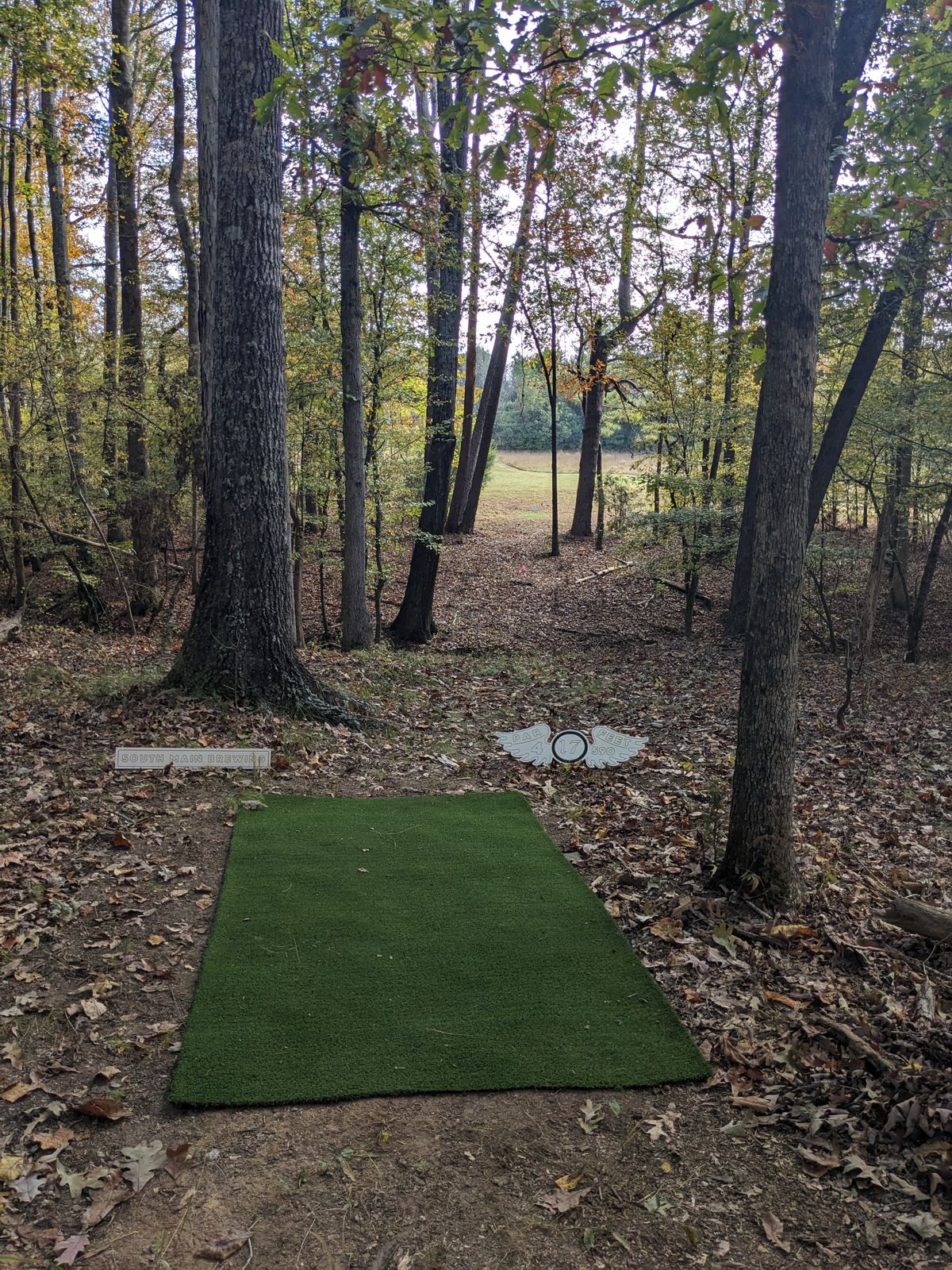 Black/Blue Layout Tee

2023 Practice day while staff was still staking down turf.  We straightened it out