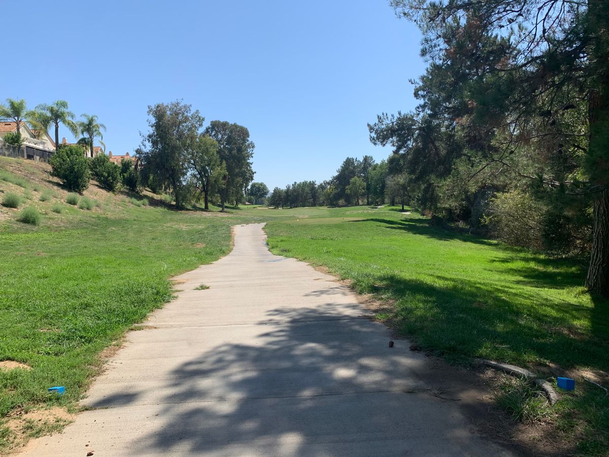 Omega Hole 14 Tee