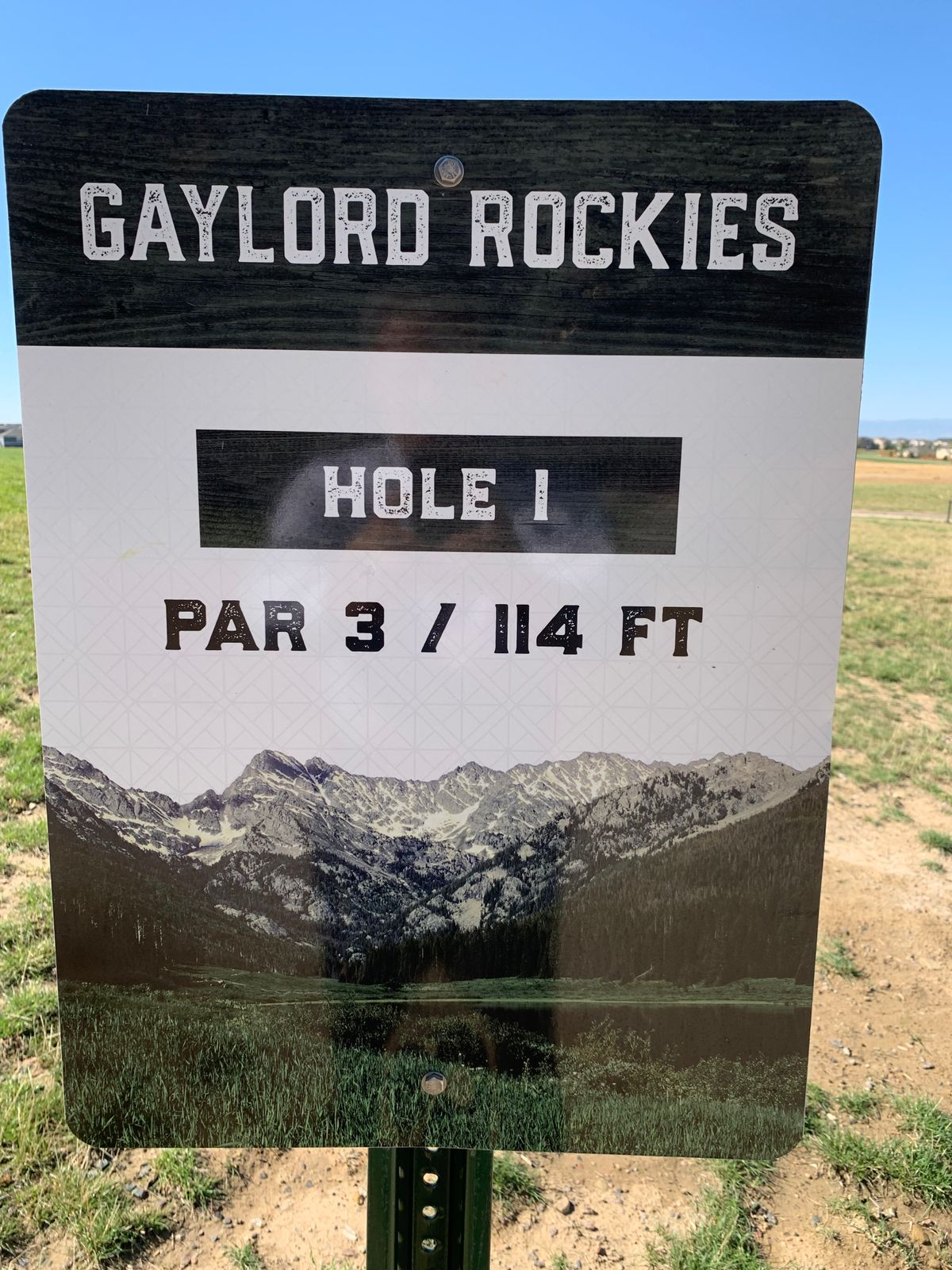 Tee off from concrete sidewalk.