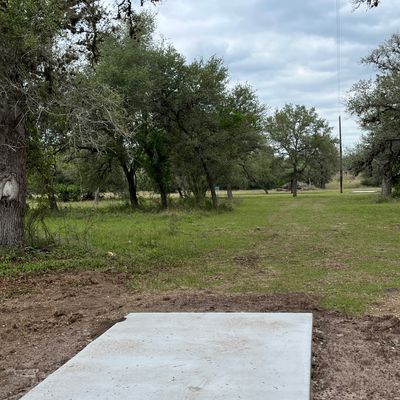 Hole 1, dogleg left, down hill