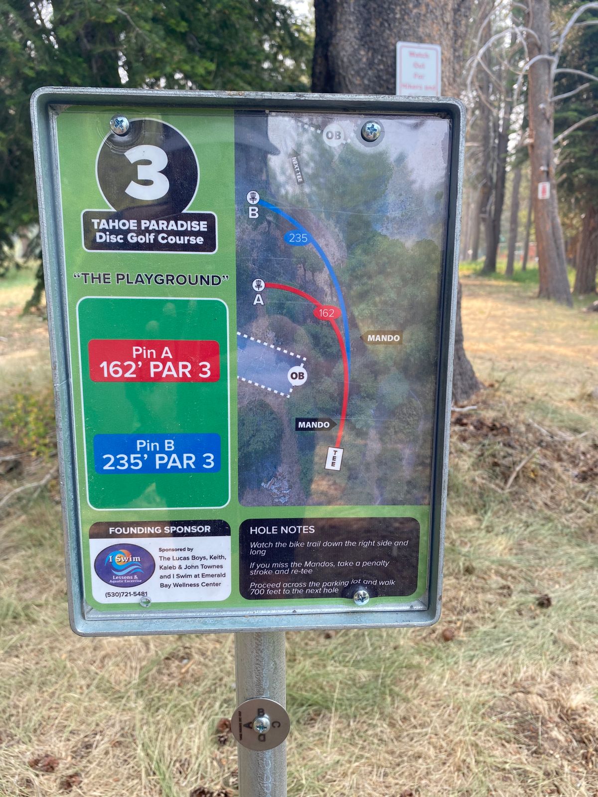 Holes 1-3 are on far side of parking lot. Holes 4-9 are on lake side across parking lot