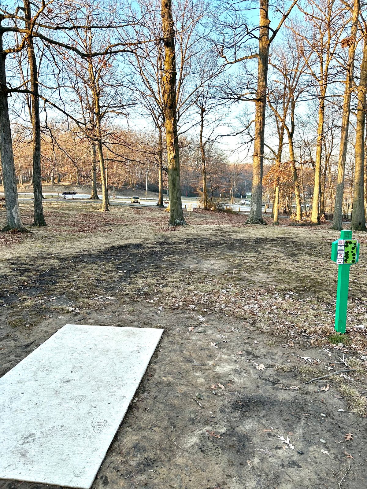 New cement tee pads on green course