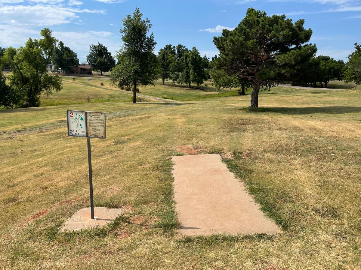 Hole 2 - 370ft Par 3. Over the creek and to the woods!