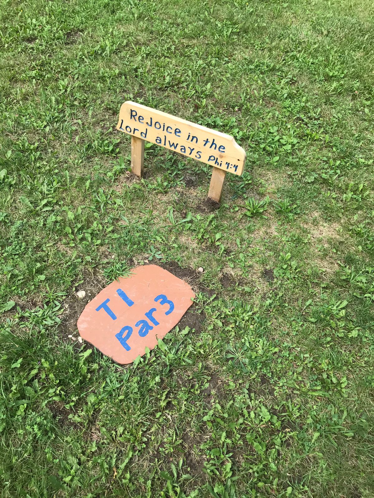 Tee 1 - No real tee pads, but I just treat the stone like a disc and throw from behind it.