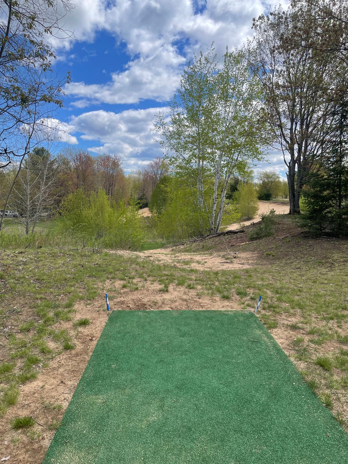 Caution, hole 3’s basket visible in the right gap