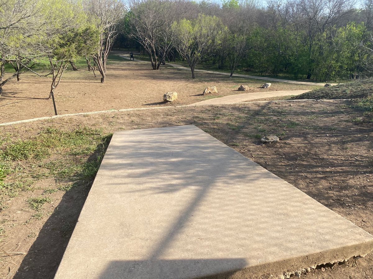 Hole 1 is a wonderful drop down into the woods. Delightful play.