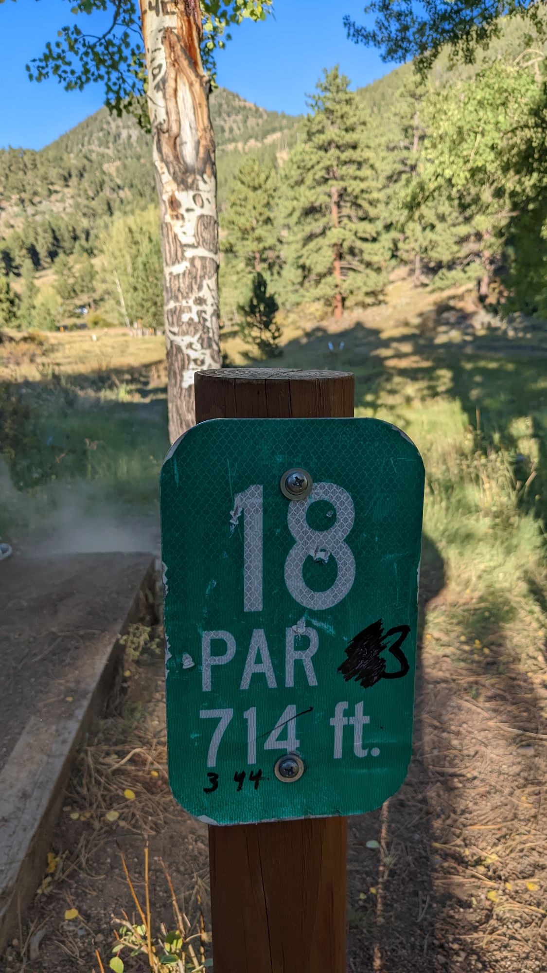 Hole 18 sign. It's definitely not 714 ft..