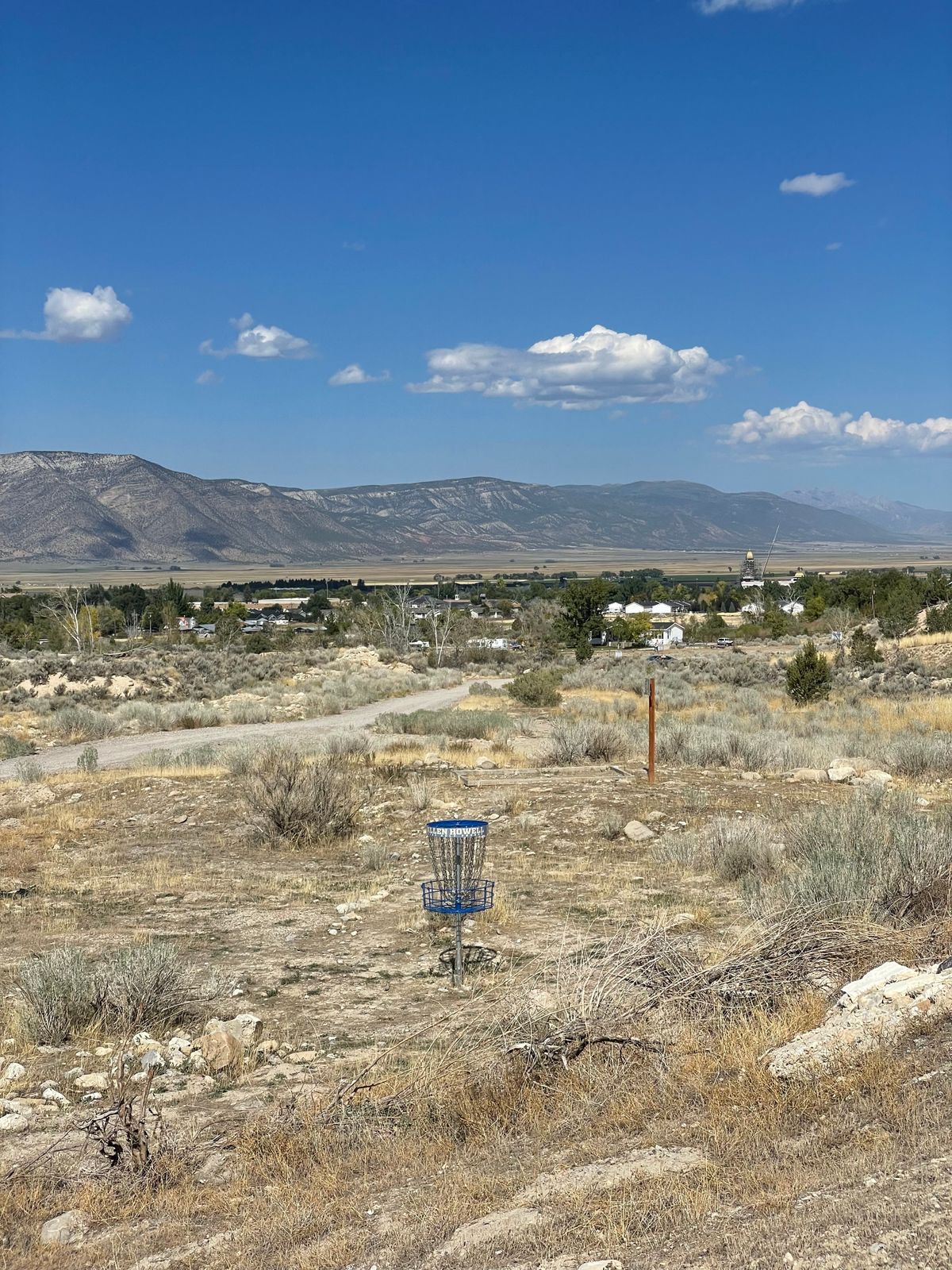 Hole 17 with 18’s tee nearby.  Looking west back over town.