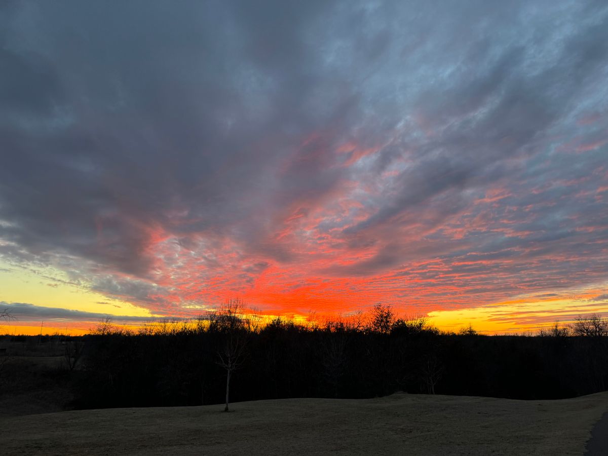 Sunset, looking back to the west on the path from 15 to 16.