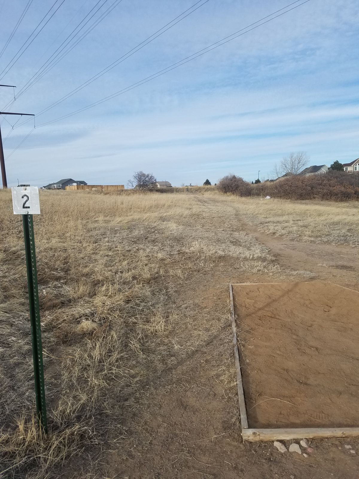 Hole #2, Straight up the hill in the middle of bushes & trees.