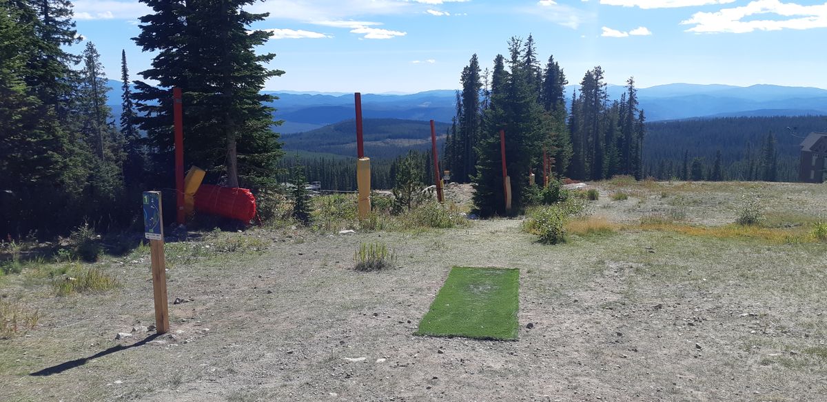 First tee pad and basket