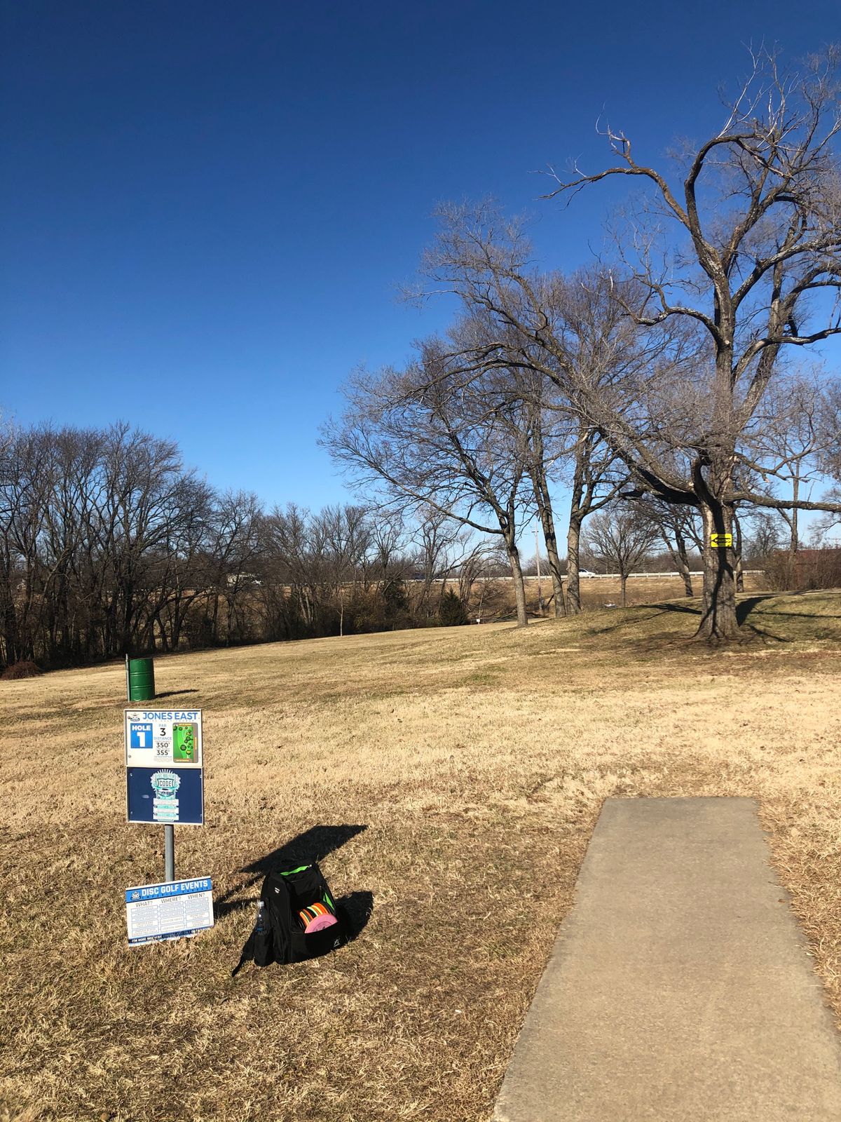 Hole 1. With the trees, distance, building and OB, hard to imagine that the pros birdie this one.