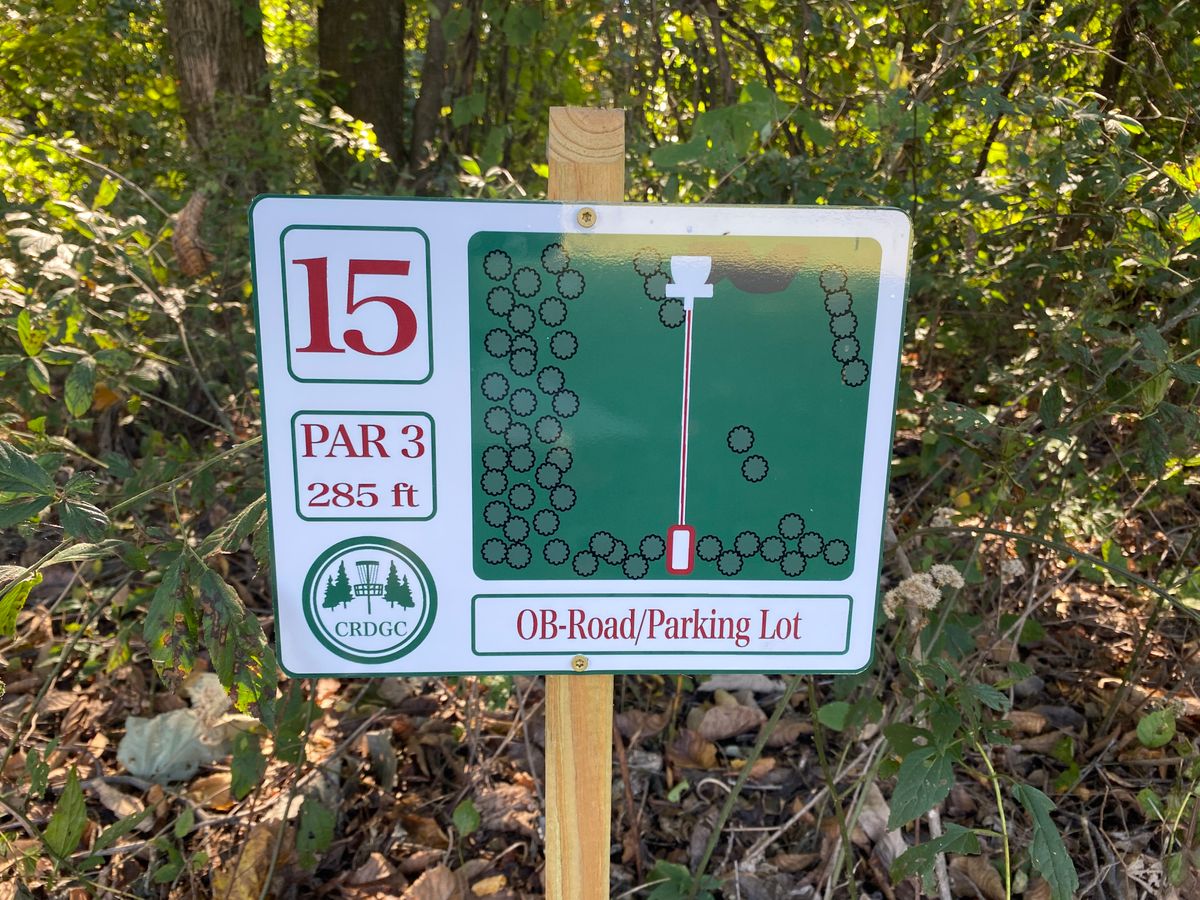 Hole 15 sign (red/white)