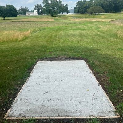 Hole 14- slight down hill with water hazard on the right.