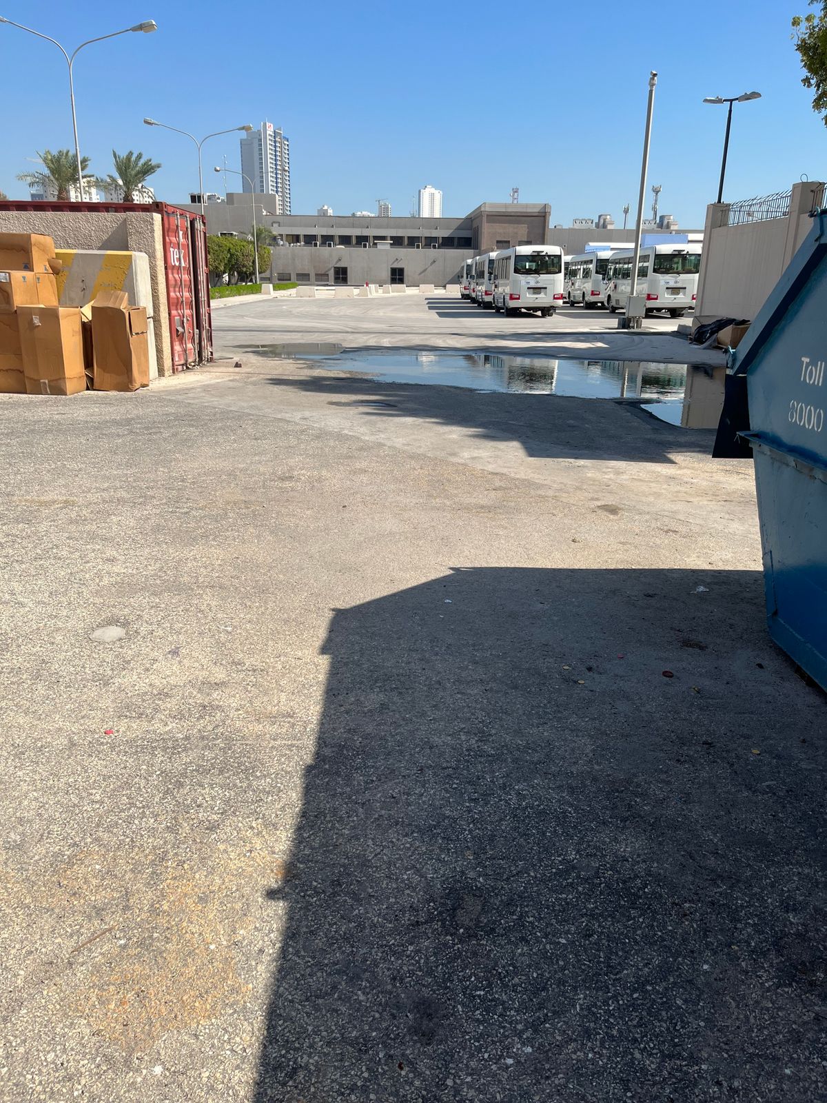 Hole 14 tee pad marked with edge of dumpster being end of pad