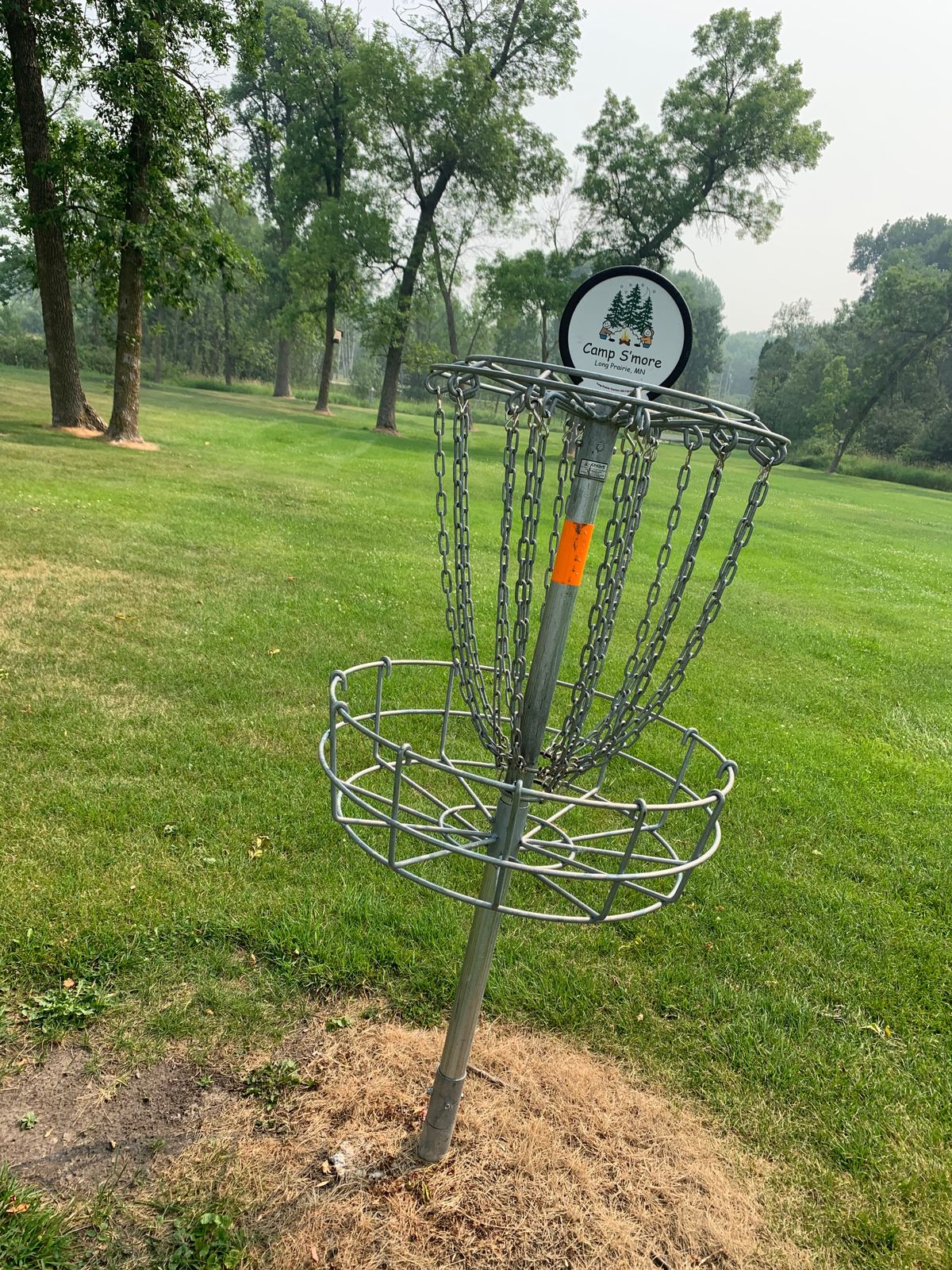 Practice basket near parking lot. The basket can be used as hole 12 after you play hole 11.