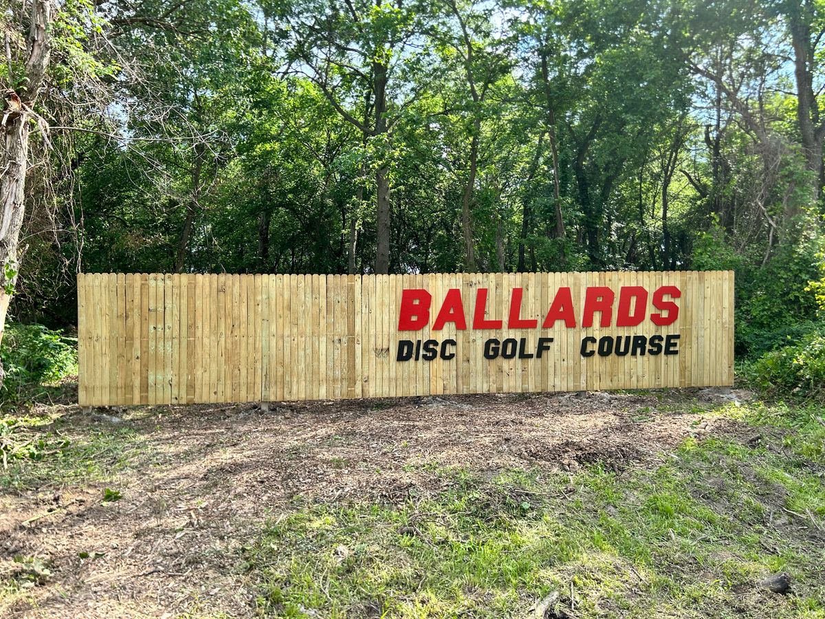Main entrance on left side of fence