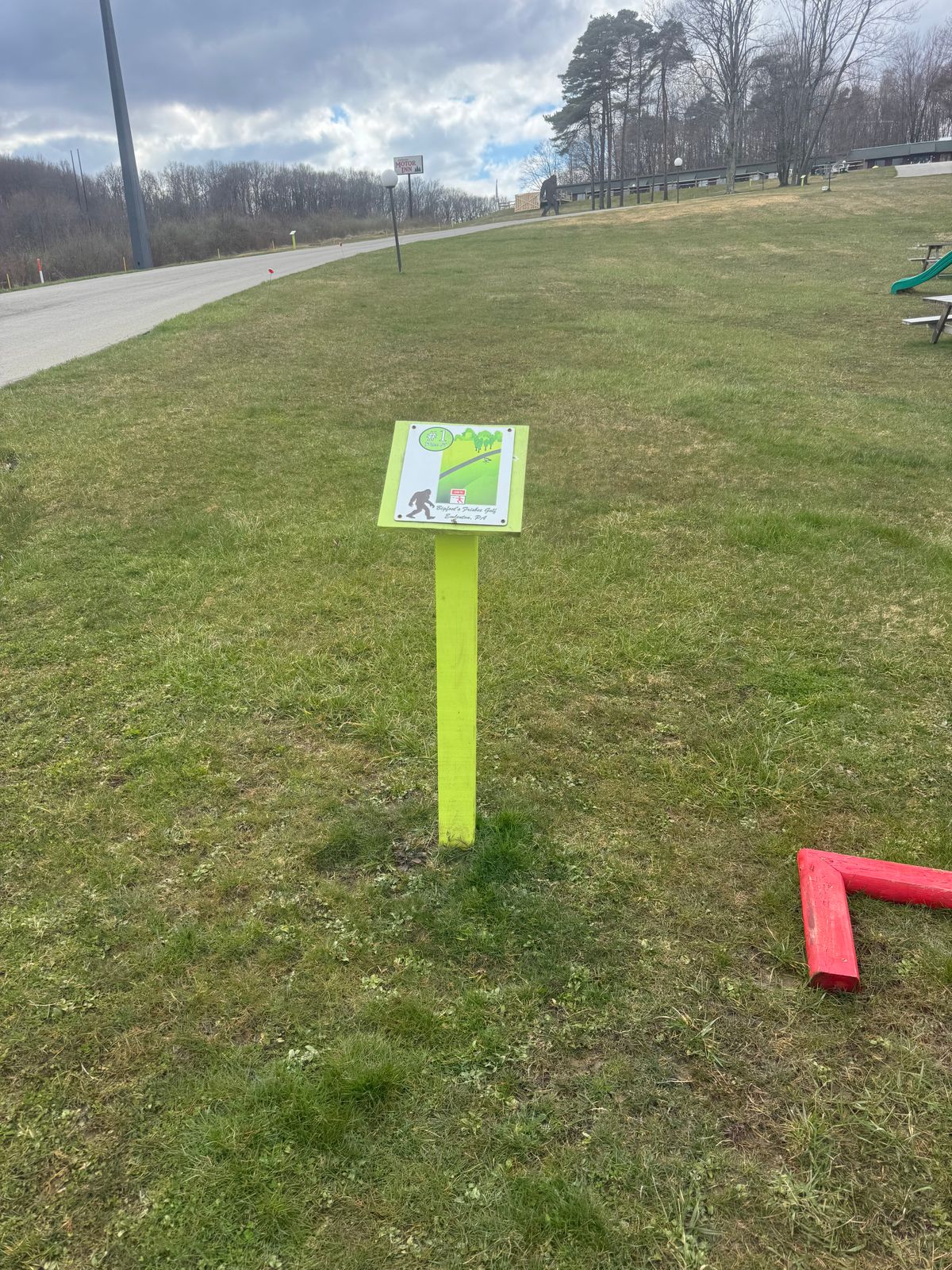 Tee sign hole 1