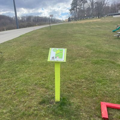 Tee sign hole 1