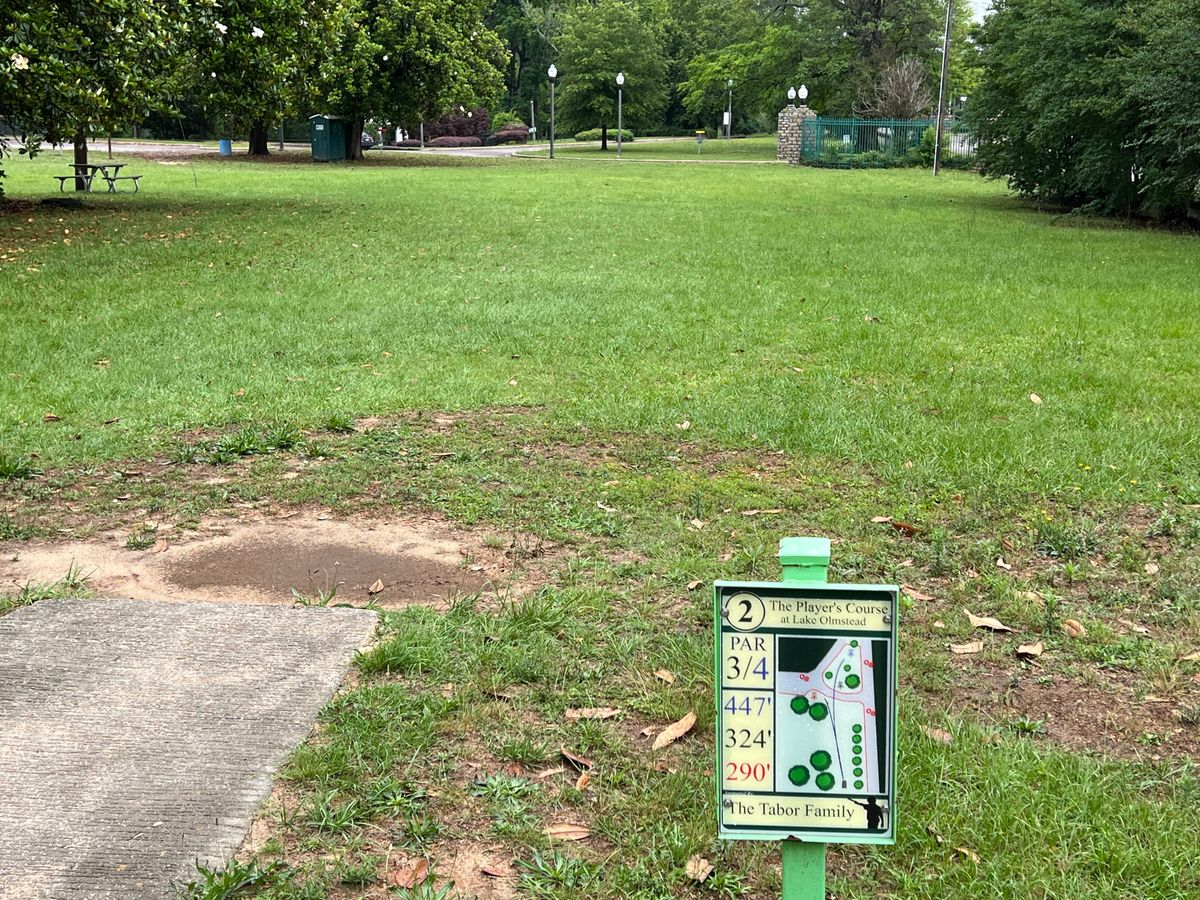 Hole has short red and long yellow basket. 