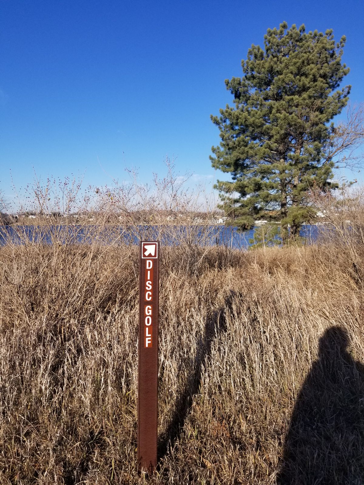 Follow the sign next to the picnic gazebo to the first tee. Google map directions lead to the correct location.