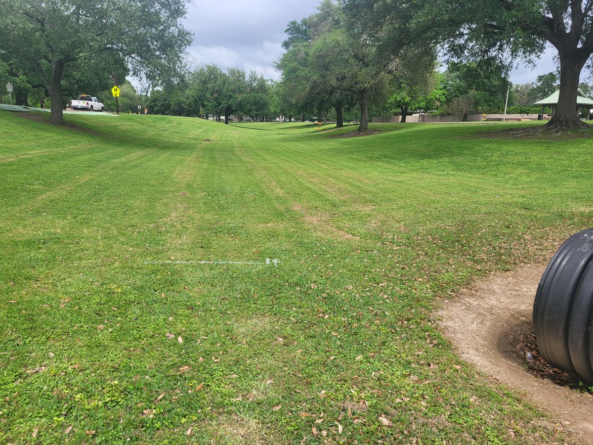 GG-Hole #4 - On or across walking path is OB.