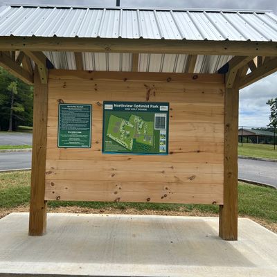 Entrance kiosk with course layout and rules.