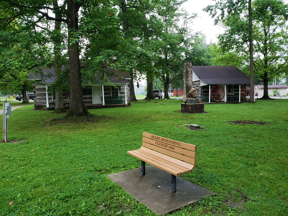 Forest Park DG course wraps around these historic old cabins.