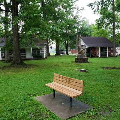 Forest Park DG course wraps around these historic old cabins.