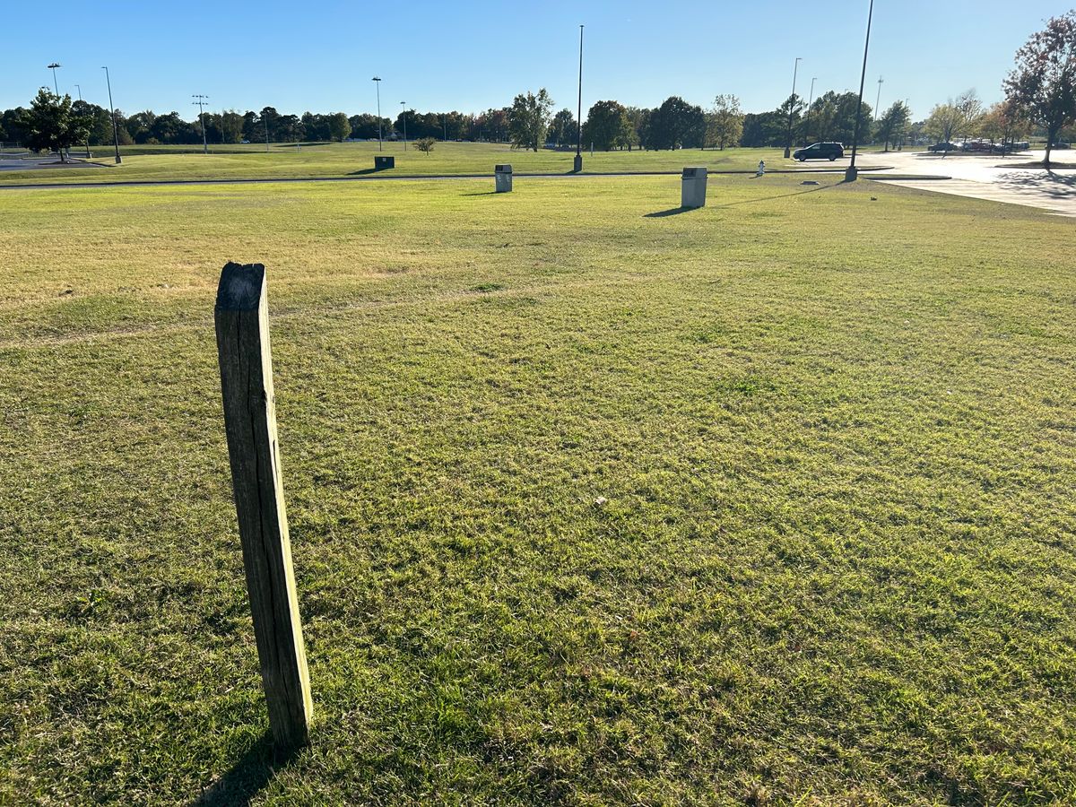 Hole #18 Grass Tee Pad. Watch out for cars when you throw over the roads. 