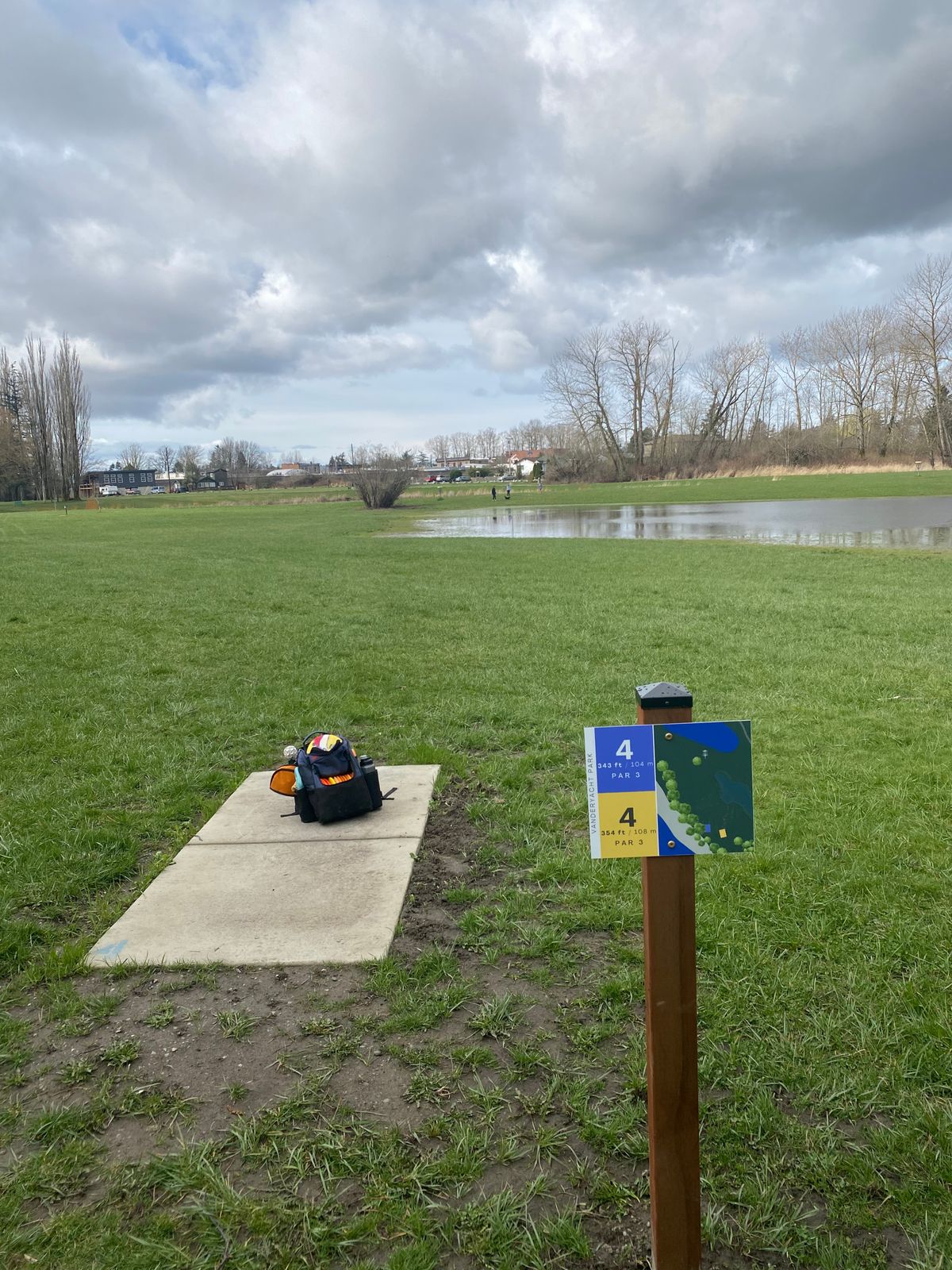 Hole 4 blue tee pad with new sign