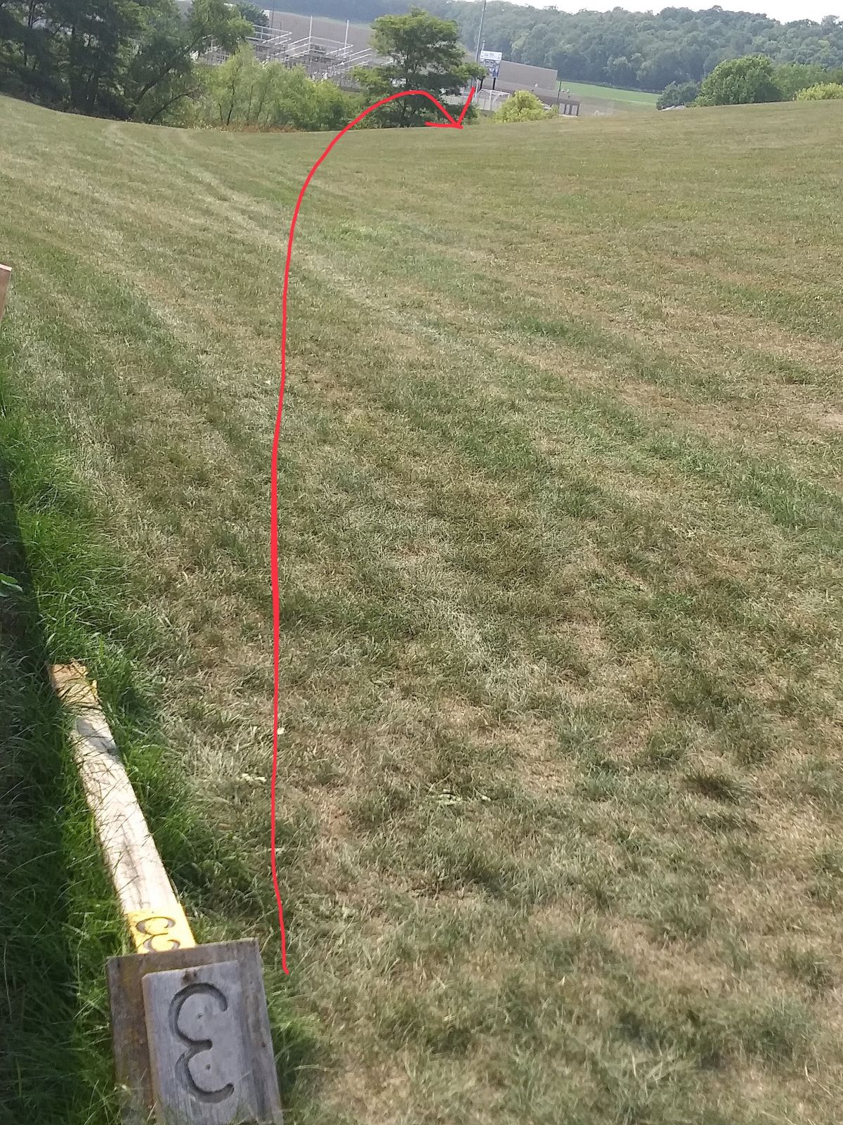 Hole three is on the other side of the hill