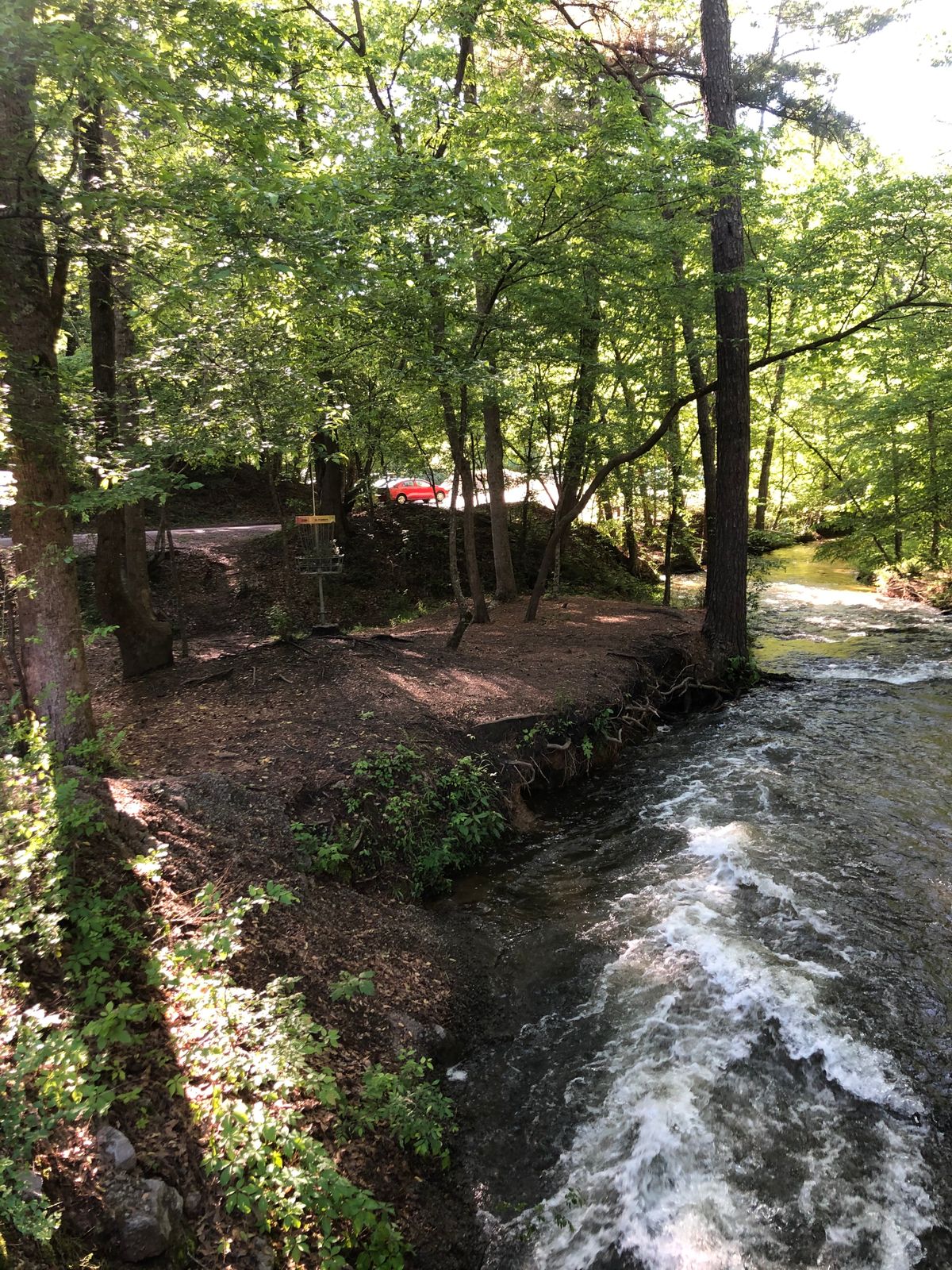 Hole 18 with creek running in front