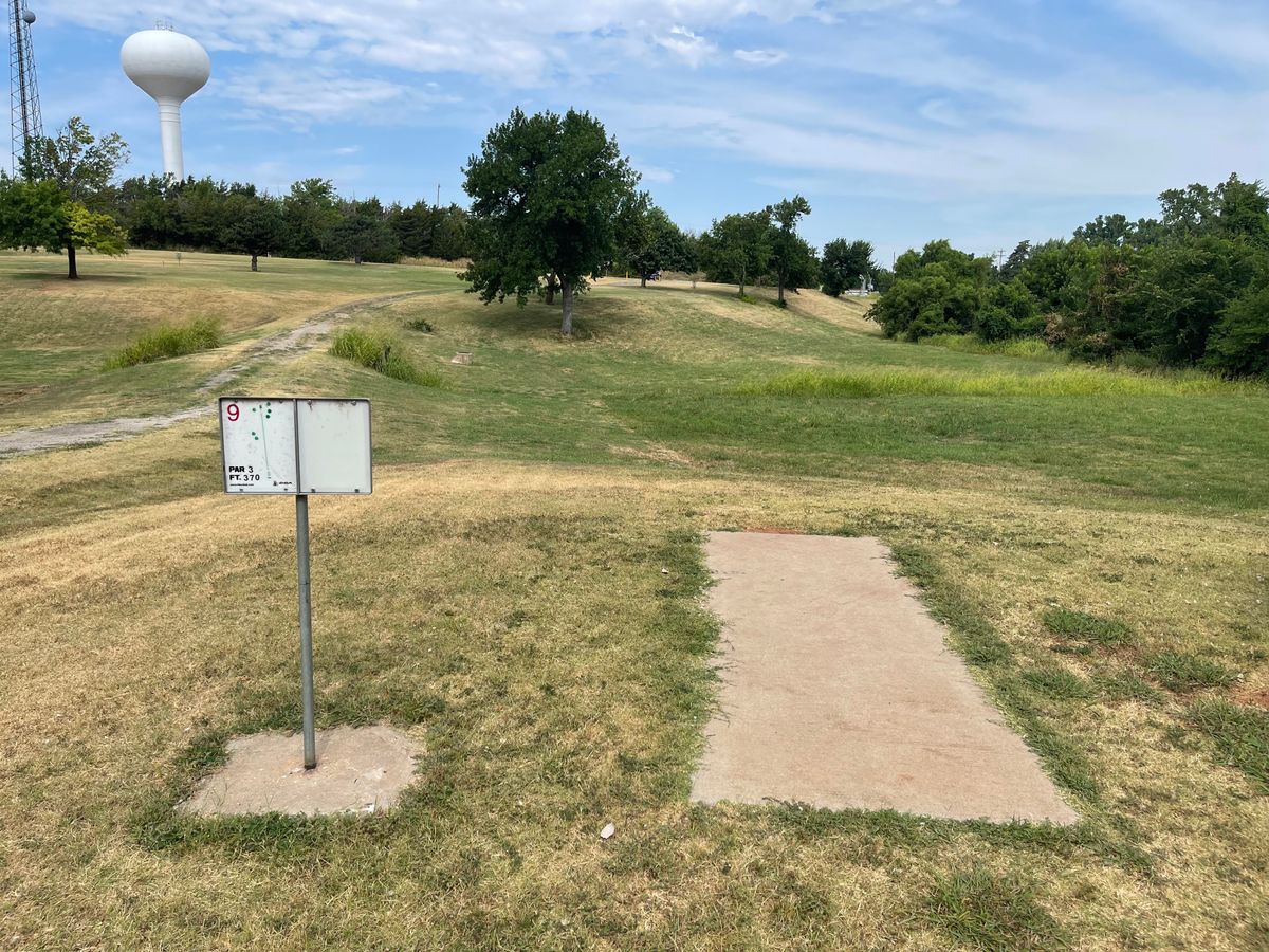 Hole 9 - 370ft Par 3. Overall slightly uphill, plays long. Creek on the right will eat discs.