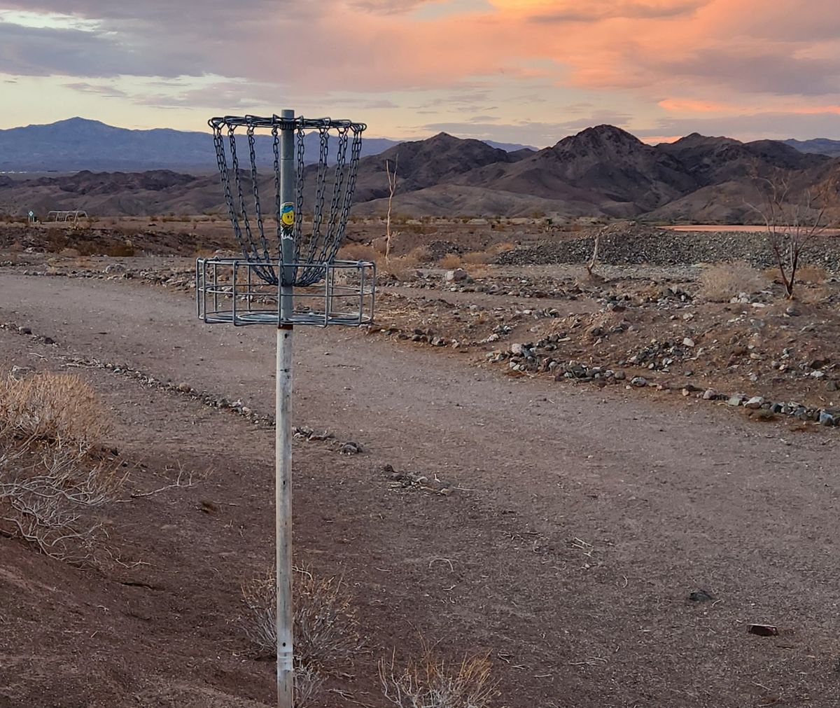 Hole 8 elevated old school basket donated from Humboldt county.