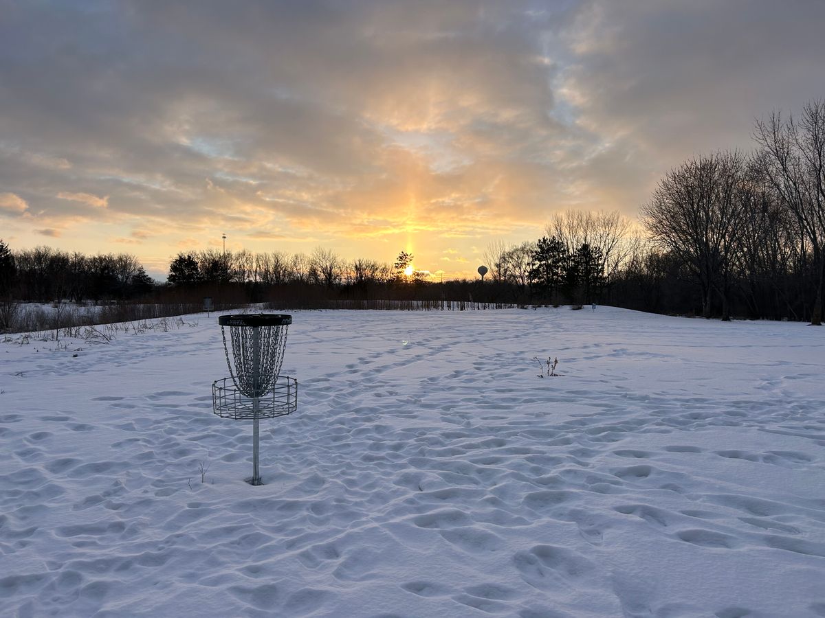 Hole 7 basket with nice sunset