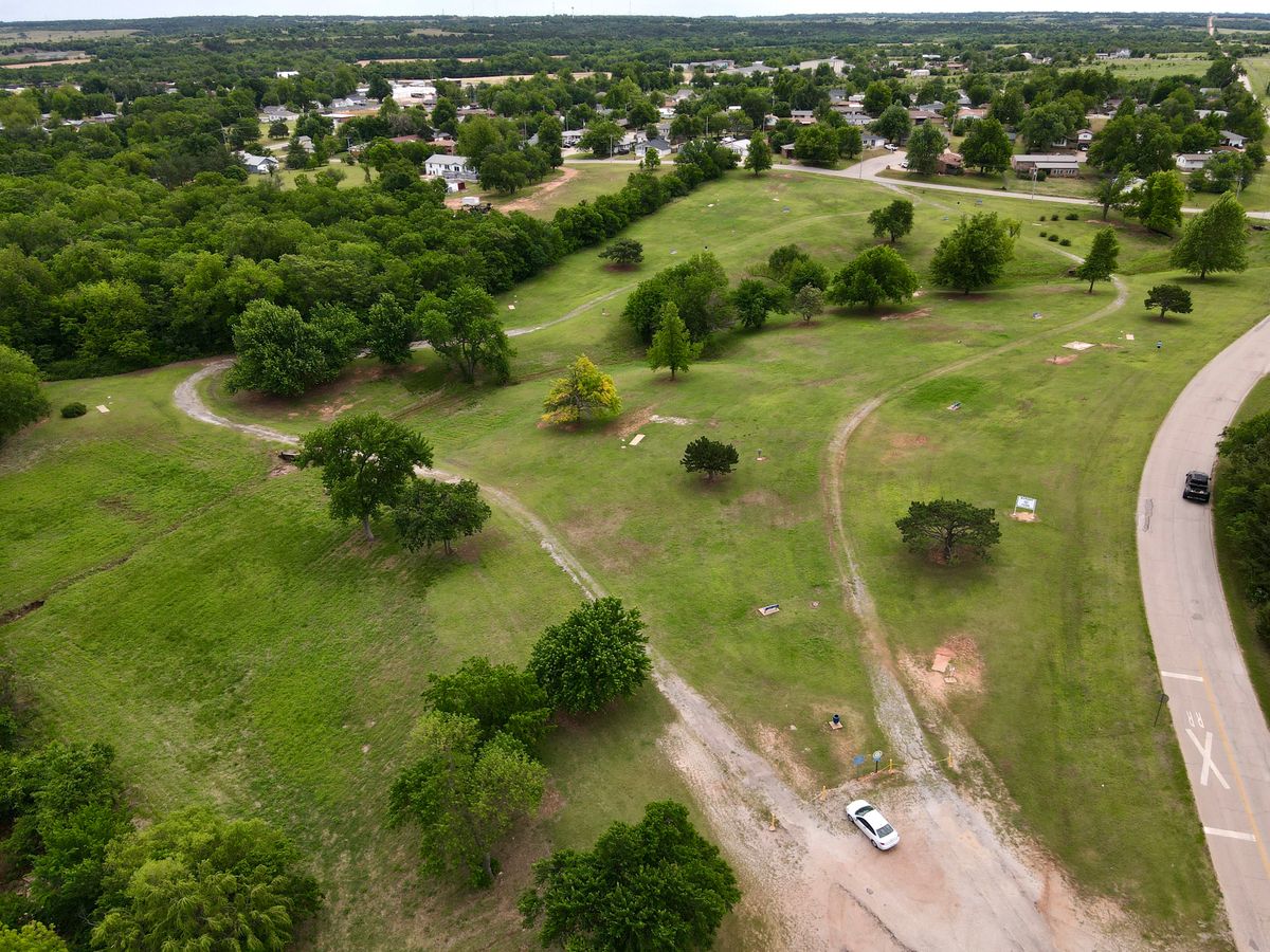 Aerial view over parking lot looking southeast.