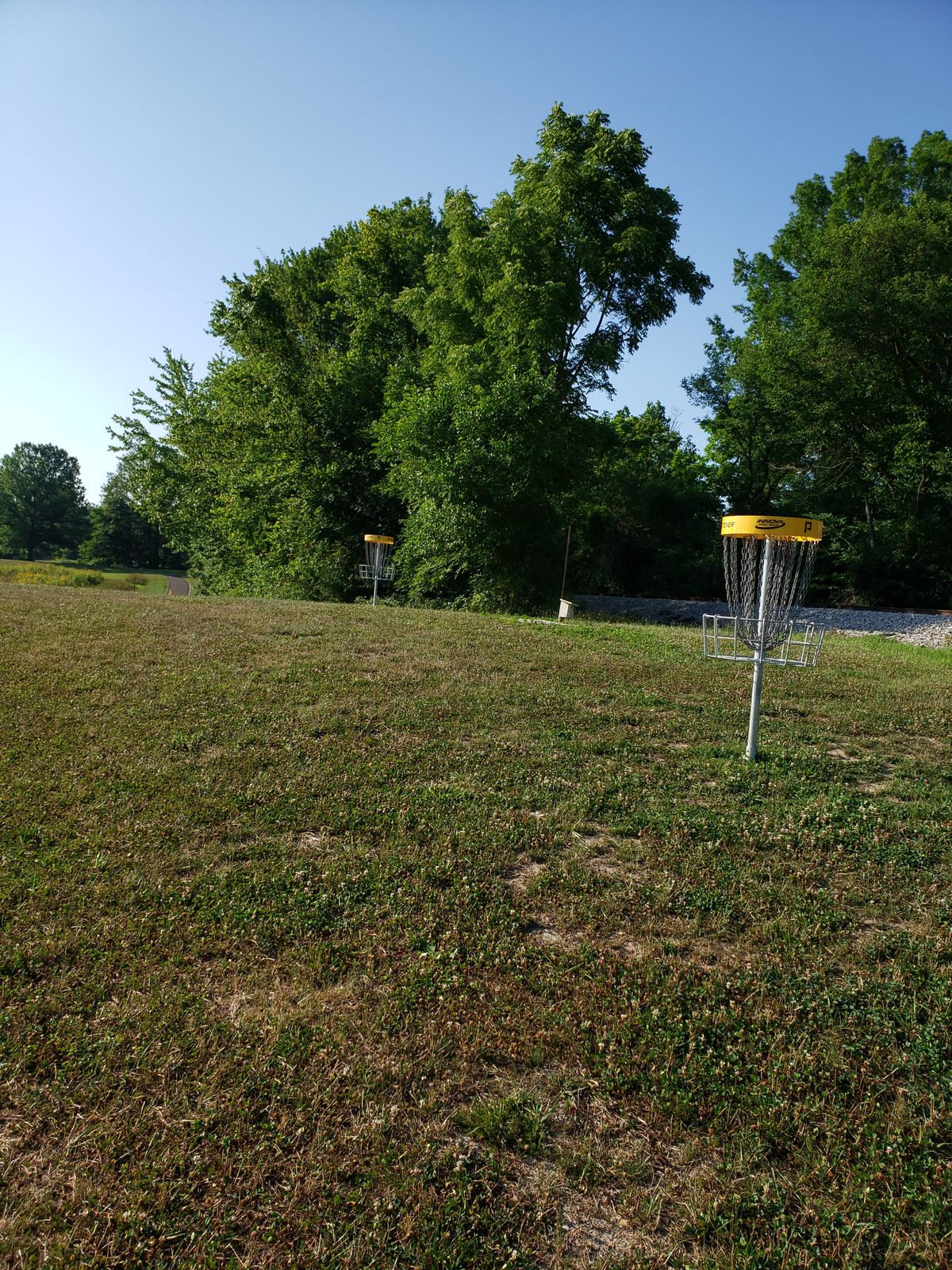 Two putting practice baskets.