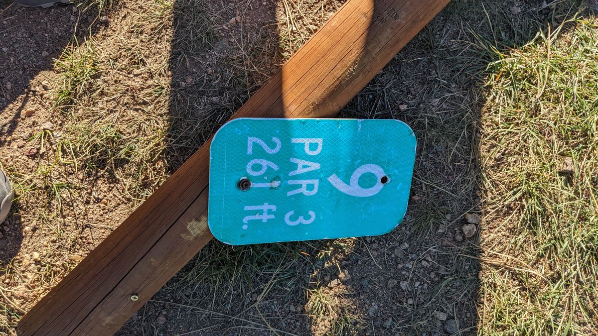 Hole 9 sign, broken