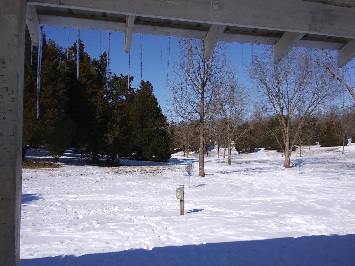 Icicled shelter looking at #10 snow tee towards practice basket and #18 basket