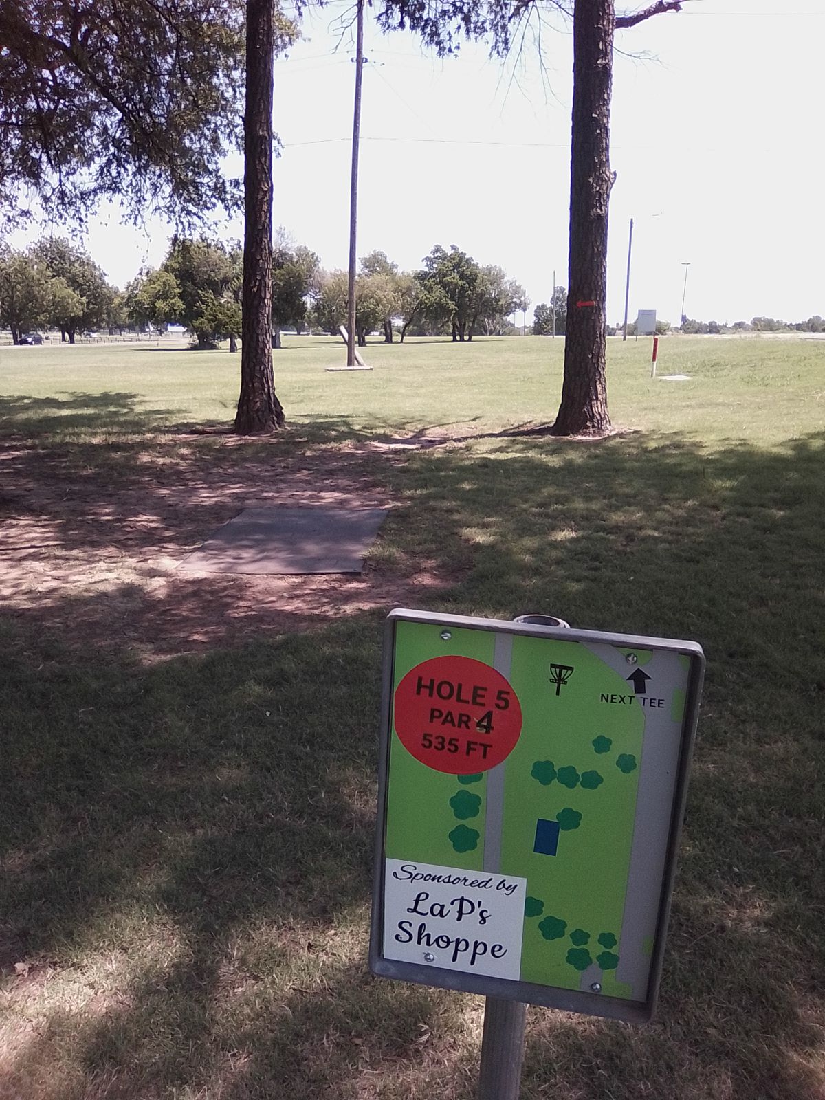 Tee #5 (PAR 4) (Orange MANDO Arrow on the Right Tree)